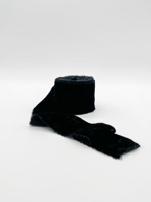 Black velvet ribbon raw edge