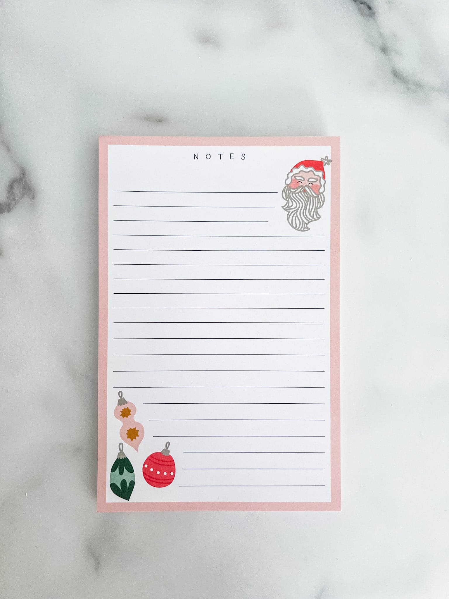 Christmas lined notepad with a santa and bulbs