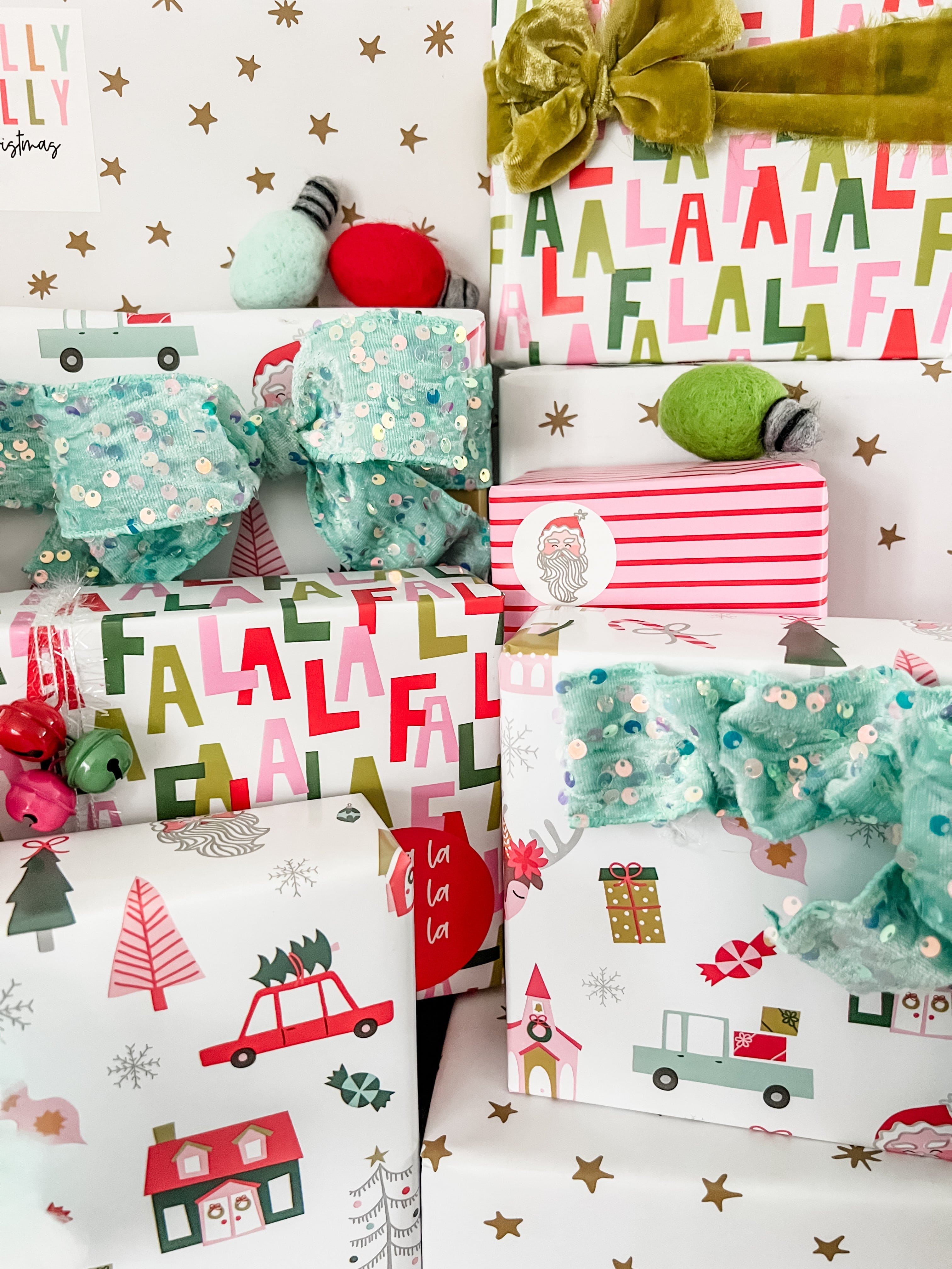 Christmas-themed gift wrap with festive designs and text.