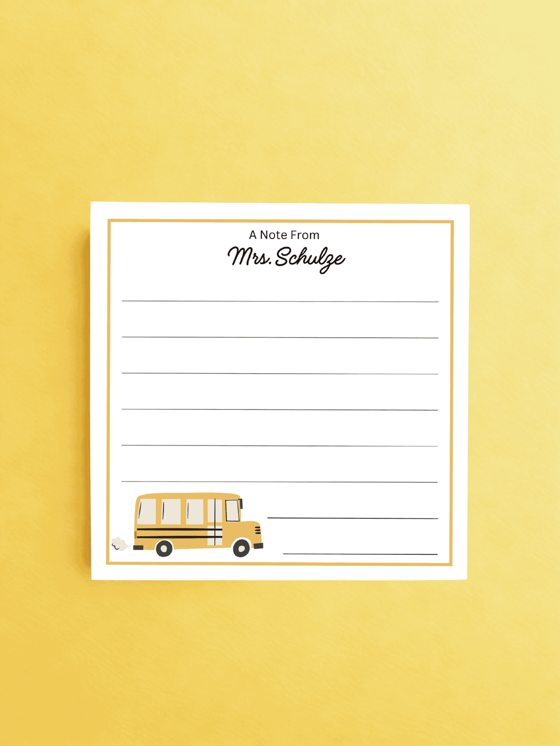 Personalized teacher notepad with lines for writing and a bus